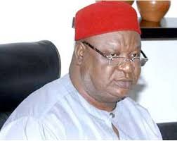 Anyim Receives Book On 2014 CONFAB